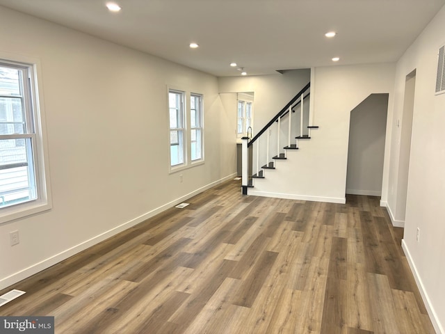 interior space with hardwood / wood-style floors