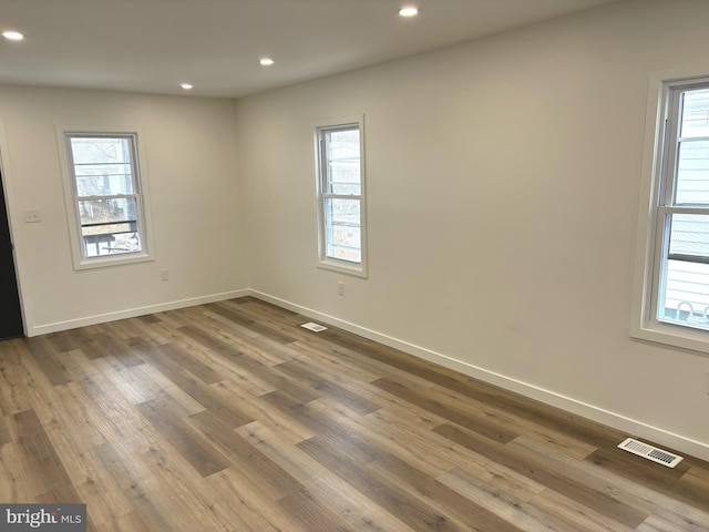 empty room featuring hardwood / wood-style floors