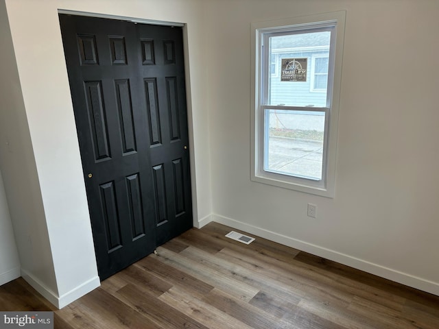 entrance foyer with wood-type flooring