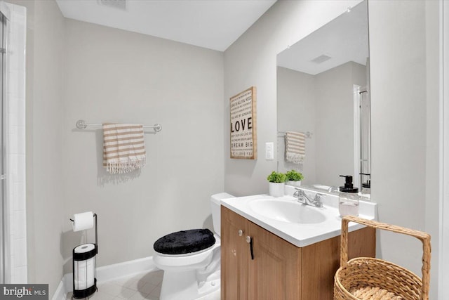 bathroom with a shower with shower door, baseboards, toilet, and vanity