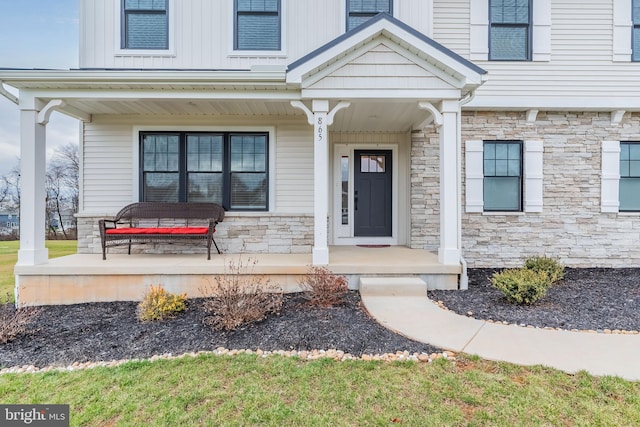 entrance to property with a porch