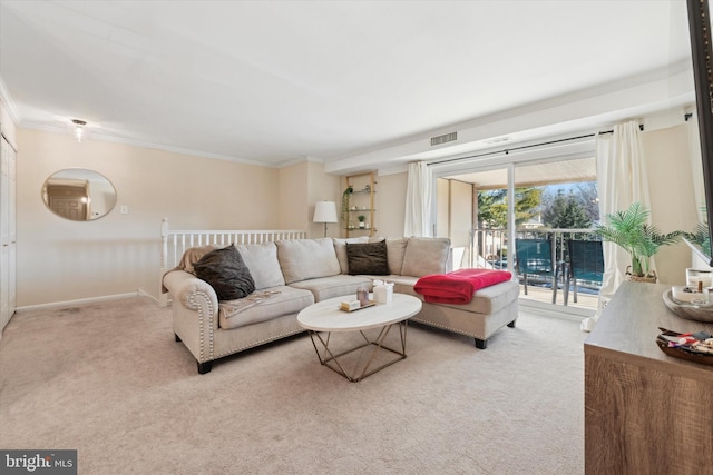 living room with crown molding and light colored carpet