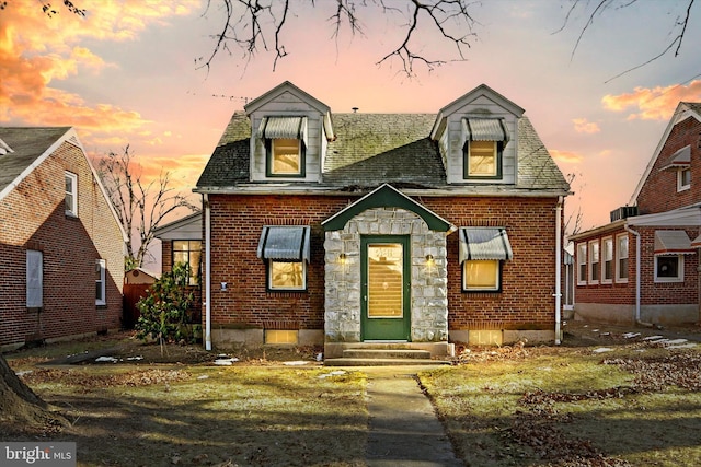 view of cape cod-style house