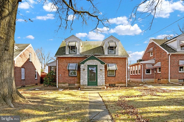 view of front of home with a front yard