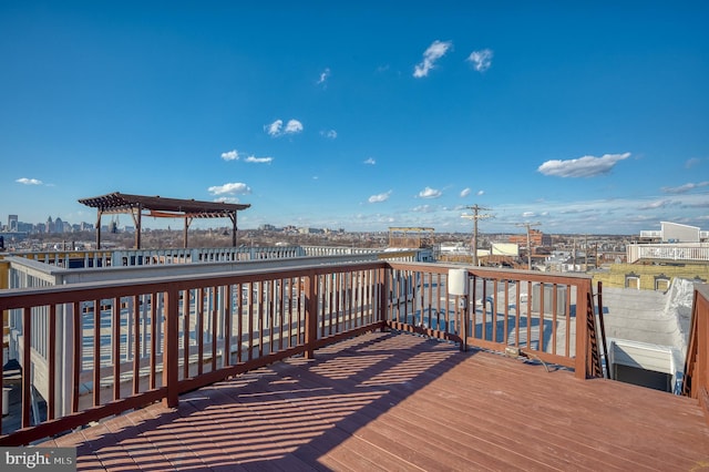 view of dock featuring a pergola and a deck