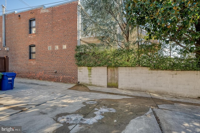 view of property exterior featuring a patio