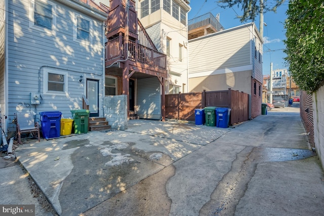 back of property featuring a balcony