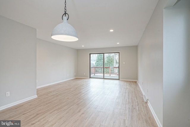 empty room featuring light hardwood / wood-style floors