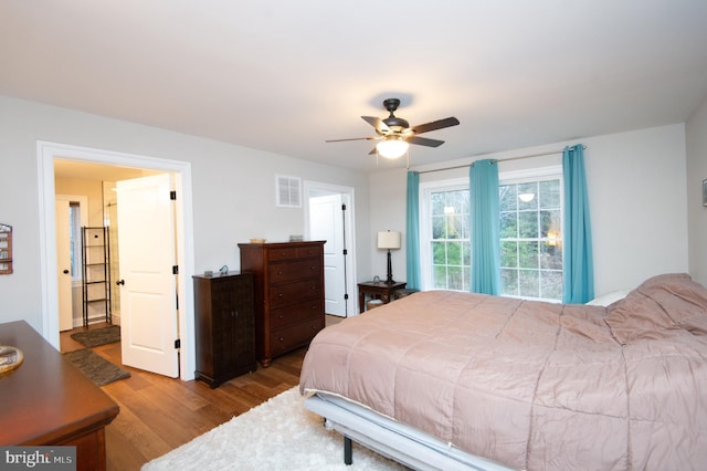 bedroom featuring light wood-type flooring and ceiling fan