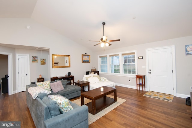 living room featuring lofted ceiling, hardwood / wood-style floors, and ceiling fan