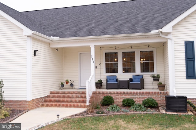 property entrance with covered porch