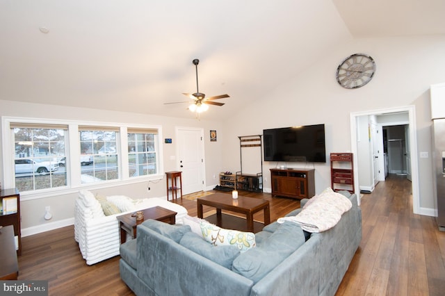 living room with vaulted ceiling, ceiling fan, and dark hardwood / wood-style flooring