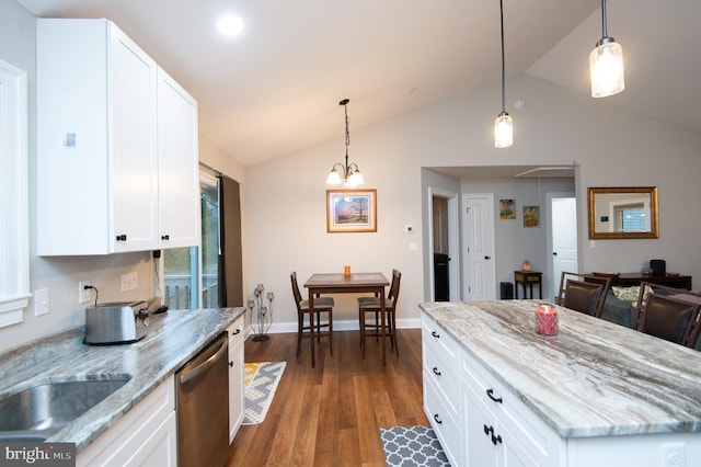 kitchen featuring pendant lighting, dark wood-type flooring, dishwasher, and white cabinets