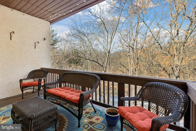 wooden deck with a water view