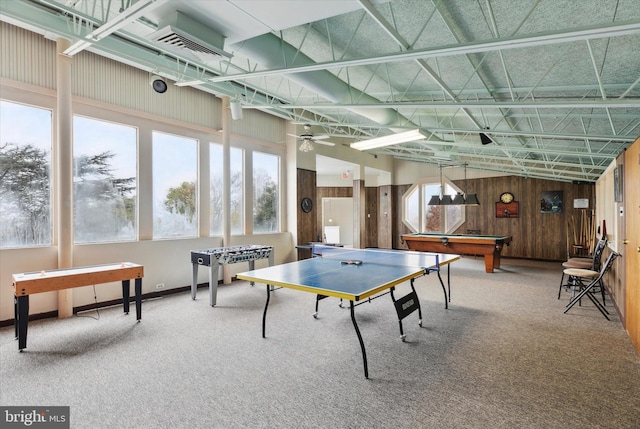 game room with ceiling fan, carpet, pool table, and wood walls