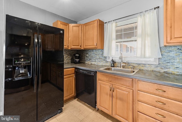 kitchen with decorative backsplash, dark countertops, a sink, and black appliances