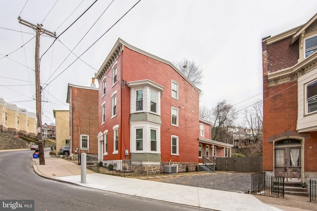 view of property with central AC unit