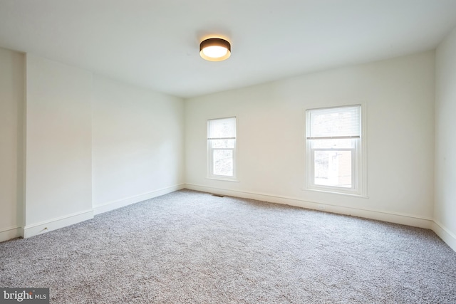 view of carpeted spare room