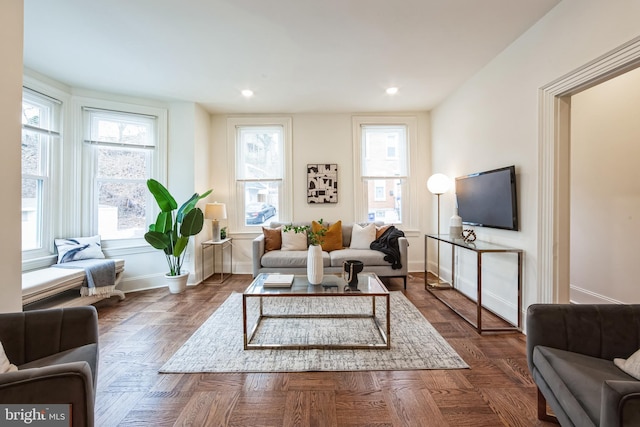 living room with dark parquet flooring