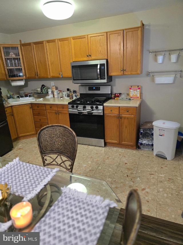 kitchen with sink and stainless steel appliances