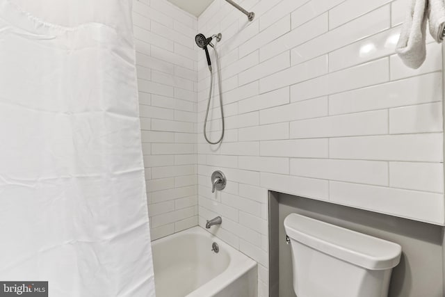 bathroom with toilet and shower / bath combination with curtain