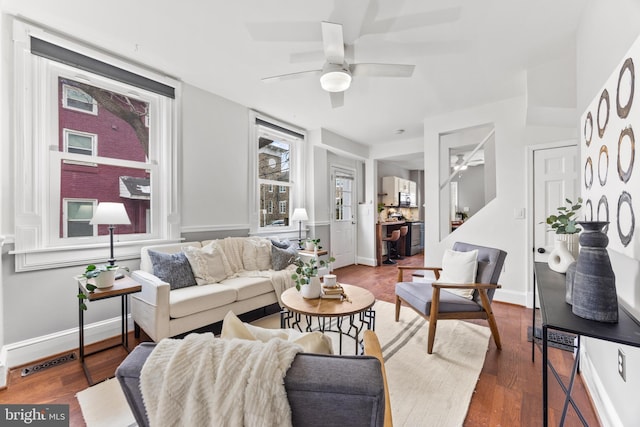 living room featuring dark wood-type flooring