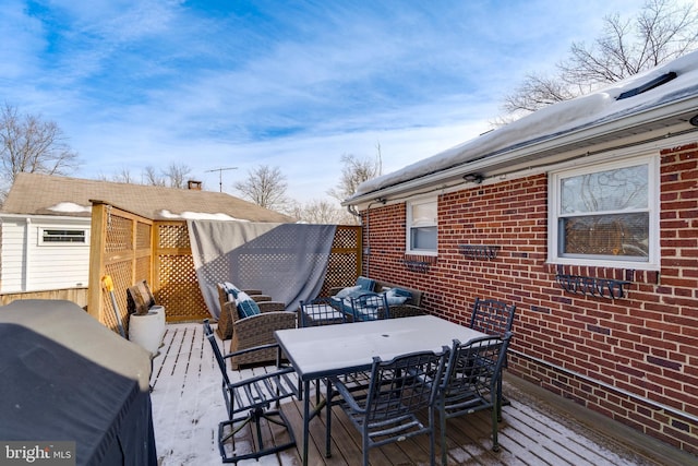 deck featuring outdoor dining area