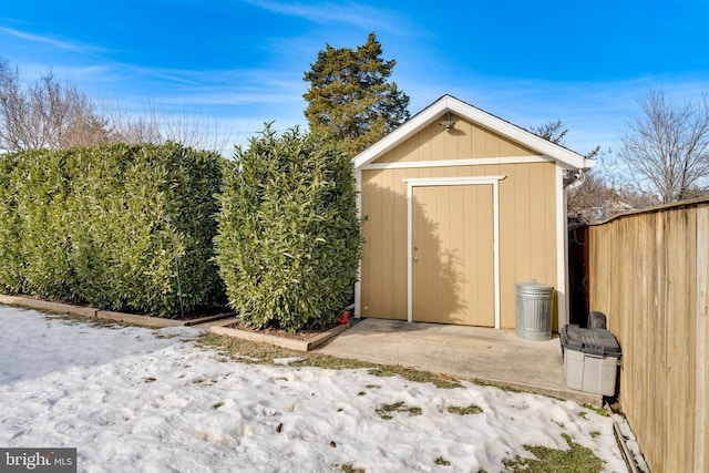 view of shed with a fenced backyard