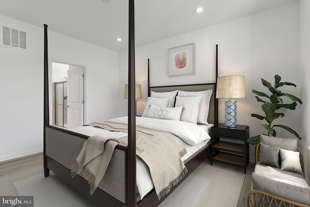 bedroom featuring light hardwood / wood-style floors