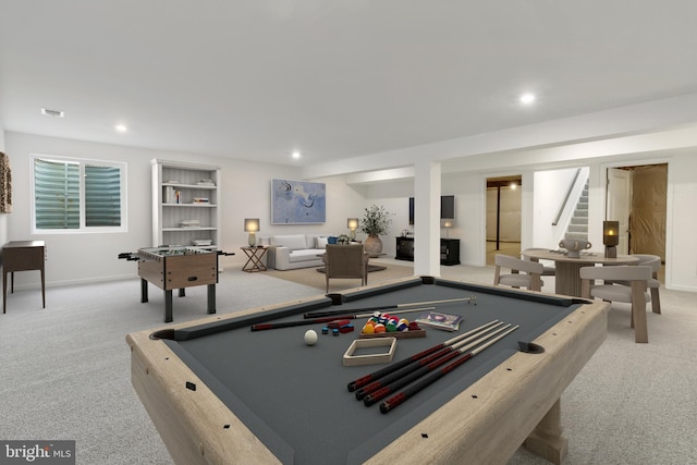 game room with billiards and light carpet