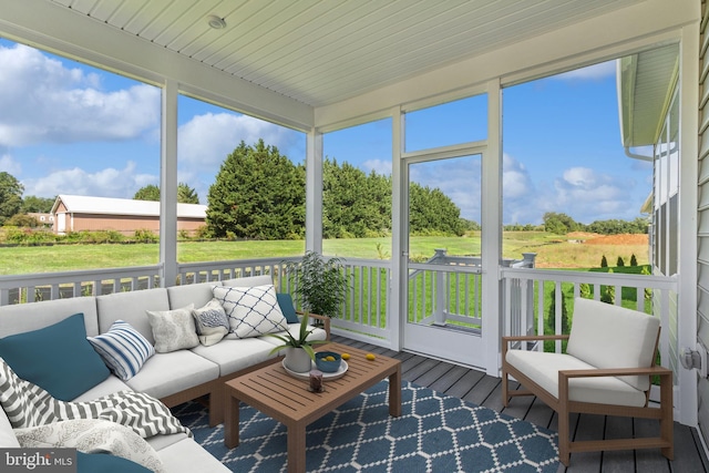 sunroom featuring plenty of natural light