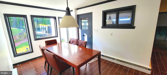 dining room featuring ornamental molding