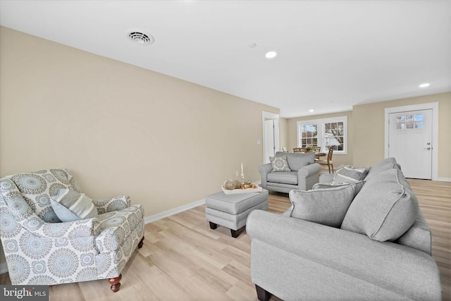 living room featuring light wood-type flooring