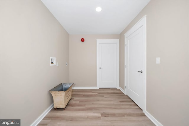 corridor featuring light hardwood / wood-style floors