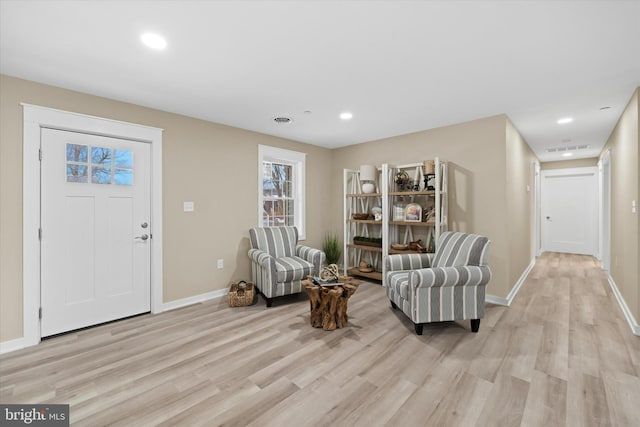 living area featuring light wood-type flooring