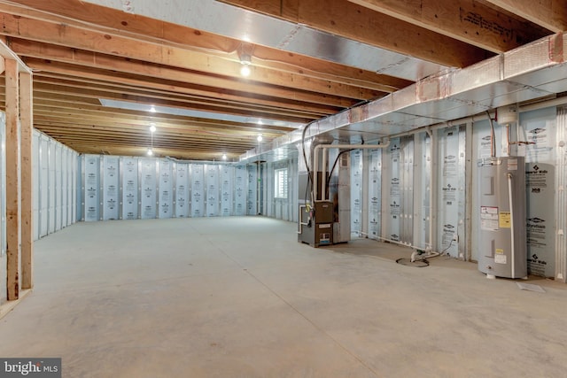 basement with heating unit and water heater