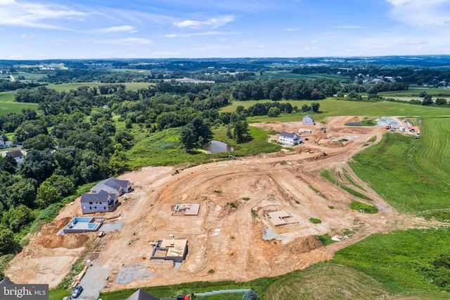 birds eye view of property featuring a rural view