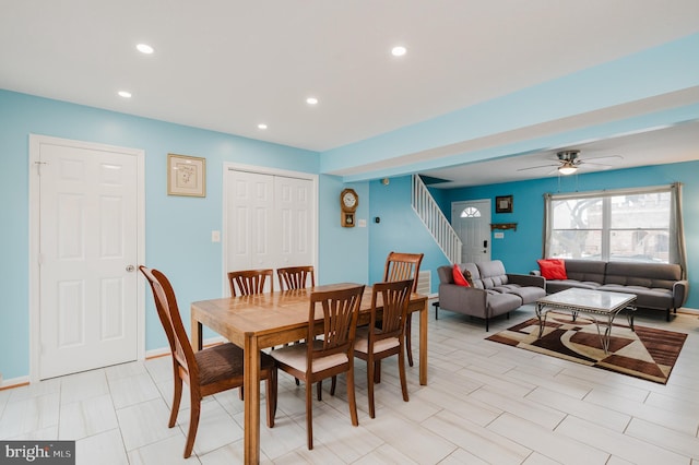 dining space with ceiling fan