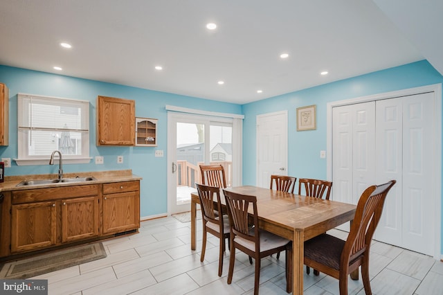 dining area featuring sink