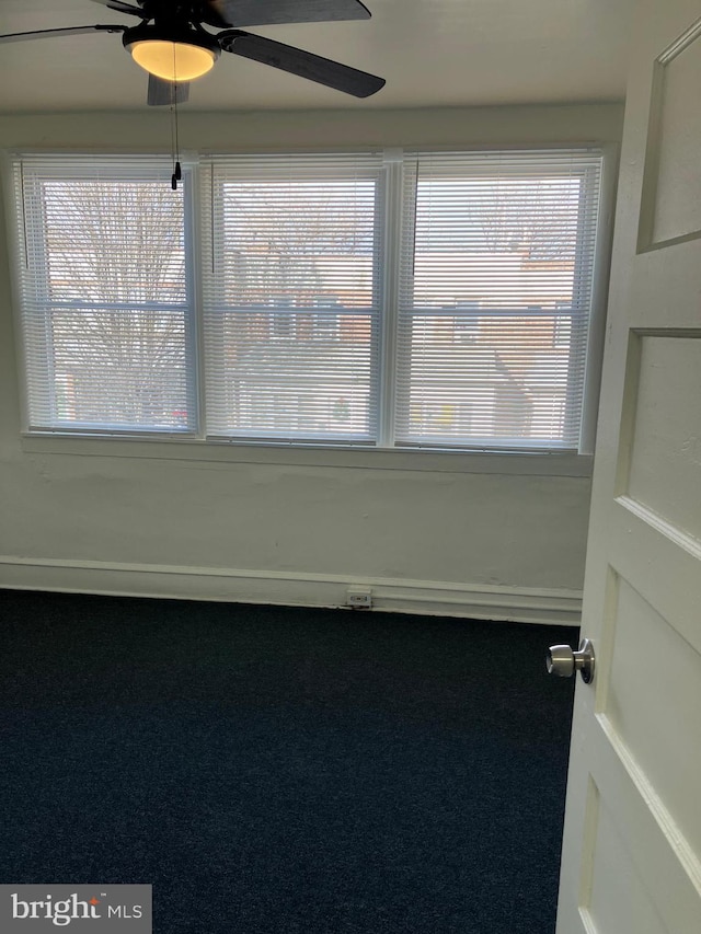 spare room featuring ceiling fan