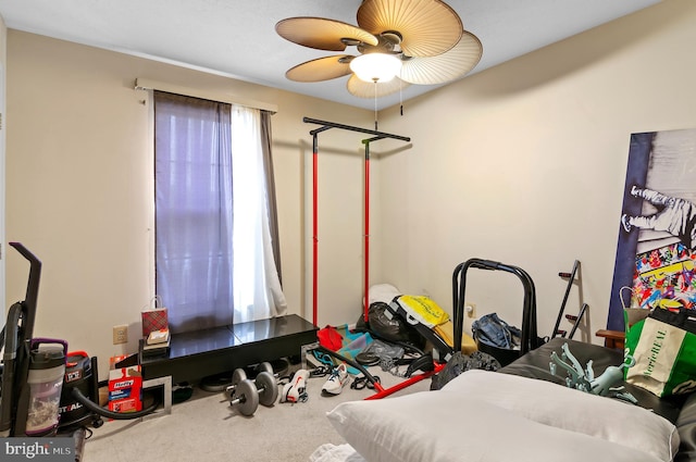 bedroom featuring carpet and a ceiling fan