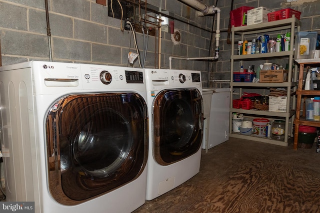 laundry area with washing machine and dryer