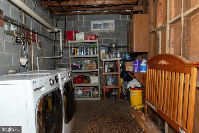 laundry area with washing machine and dryer