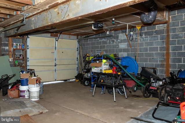 garage featuring a garage door opener