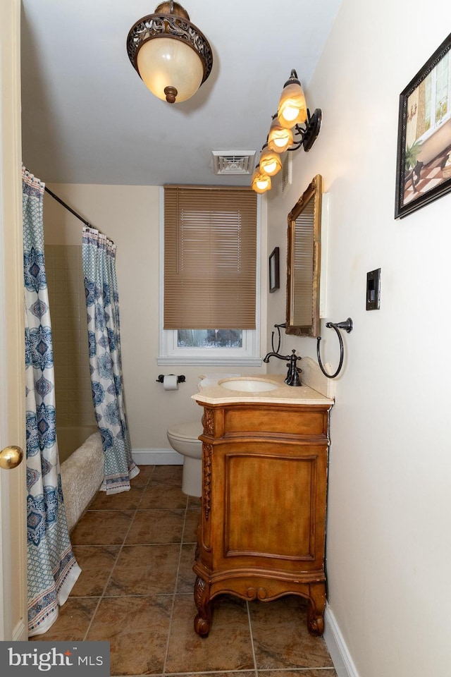 full bathroom featuring toilet, shower / bathtub combination with curtain, and vanity