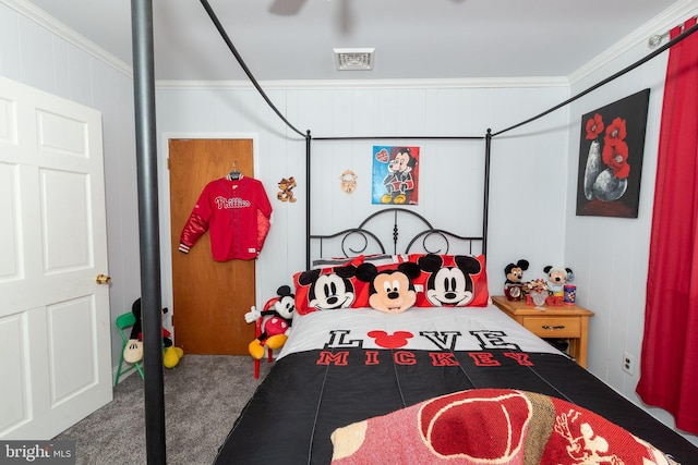 carpeted bedroom with ornamental molding