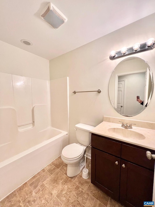 full bathroom with toilet,  shower combination, and vanity