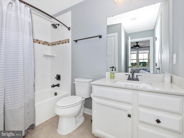 full bathroom featuring toilet, ceiling fan, tile patterned floors, shower / bath combination with curtain, and vanity