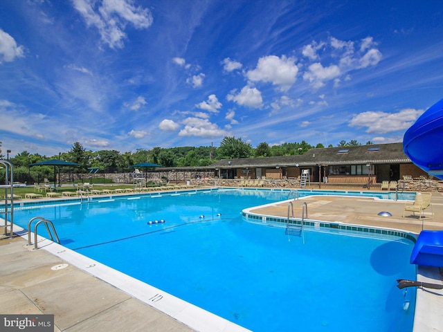 view of pool with a patio area