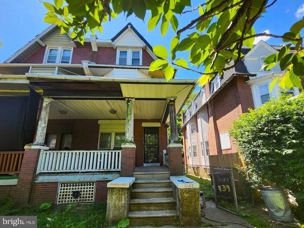 view of front of home featuring covered porch